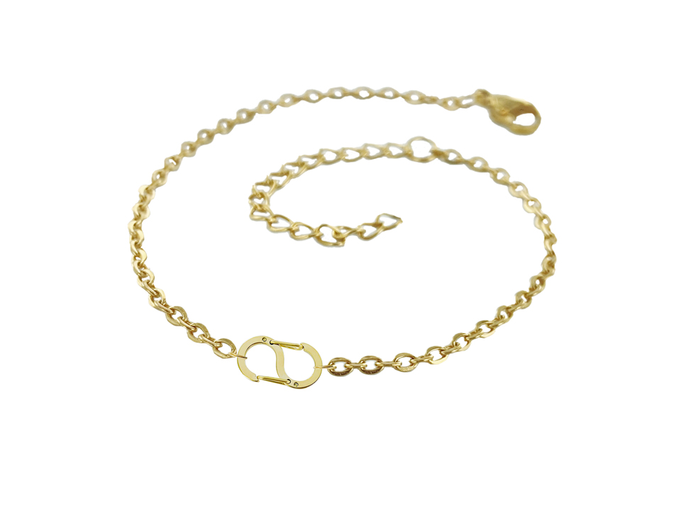 Bracelet anneau acier agrémenté d'un élément S en acier inoxydable doré