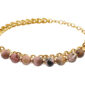 Bracelet perles naturelles (Rhodonite) et maille gourmette en acier inoxydable doré - Longueur: 15cm