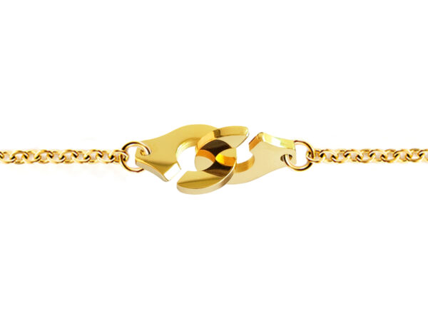 Bracelet chaînette agrémenté d'une paire de menottes en acier inoxydable doré