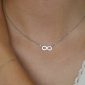Collier signe infini oxydes de zirconium en acier inoxydable argenté