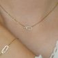 Collier trombone oxydes de zirconium et cœur nacre en acier inoxydable doré