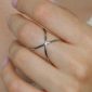 Bague ajustable croisée en acier inoxydable argenté
