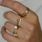 Bague ajustable trèfle en acier inoxydable doré