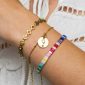 Bracelet maille boule alternée agrémenté d'une médaille ronde avec étoile ajourée en acier inoxydable doré